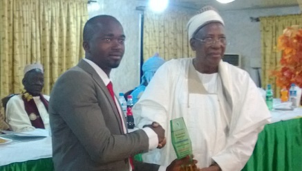 R-L: Alhaji Mohammed Hassan Koguna being presented with the Award